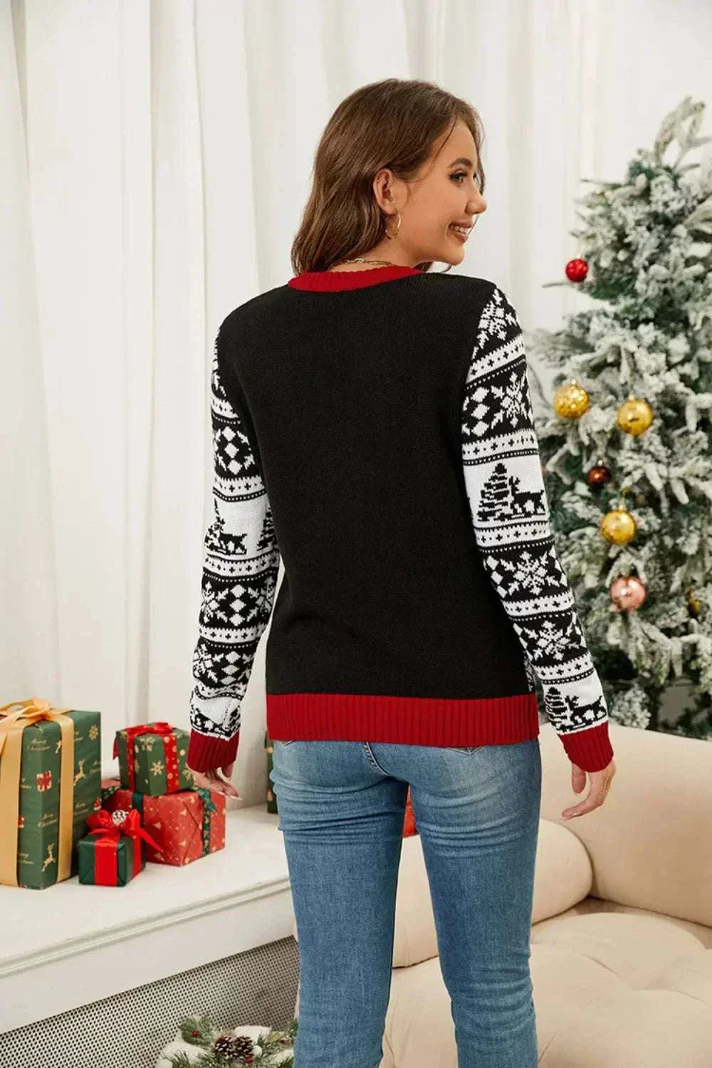 Women wearing Christmas Pattern Sweater from Hot Topic Goods with festive holiday design and cozy crewneck style