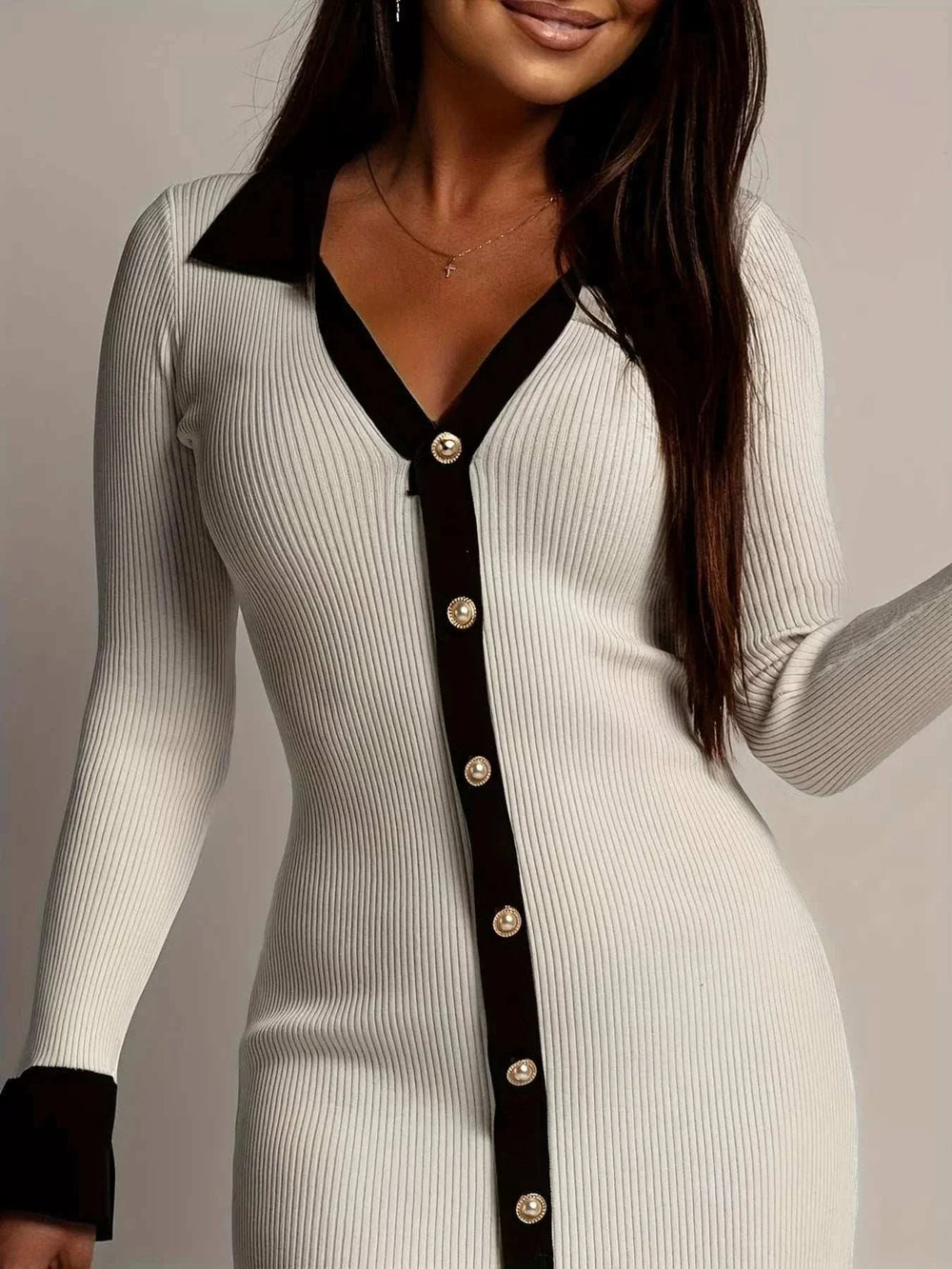 Woman wearing a soft ribbed Contrast Trim Sweater Dress with elegant detailing from Hot Topic Goods