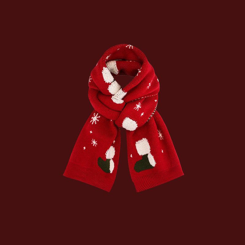 Couples wearing festive Christmas warm shawl wraps with deer and stocking designs by Hot Topic Goods