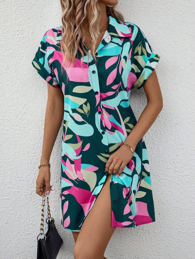 Floral print short sleeve shirt dress with vibrant colors and button-down front.