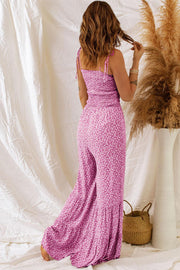 Dusk Blue Floral Jumpsuit with spaghetti straps and wide-leg design, elegant and versatile.