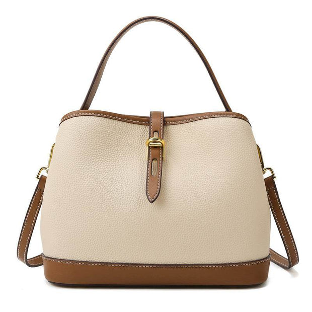 Milky white Ladies Messenger Bag with PU material and adjustable strap.