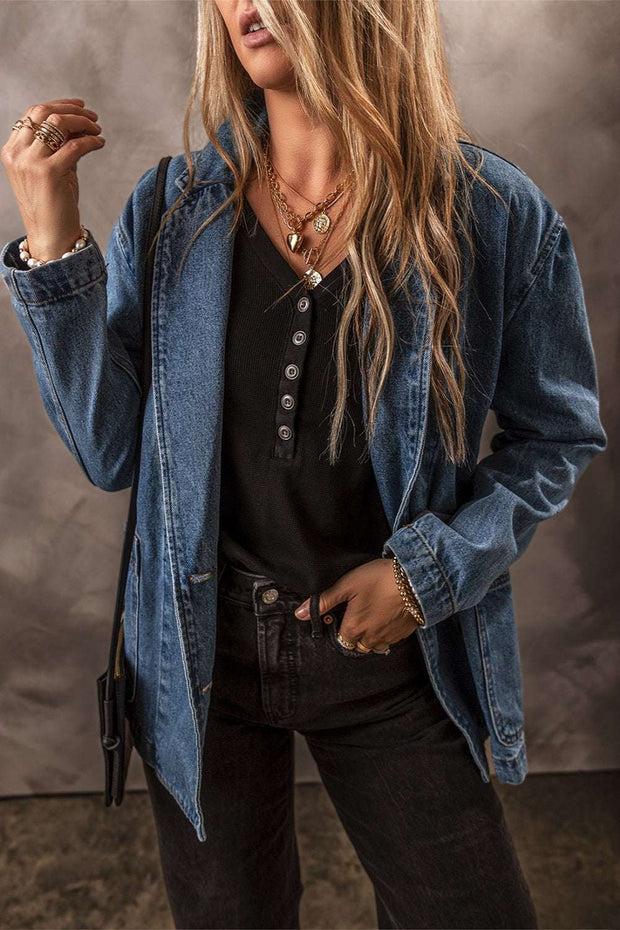 Pocketed Denim Jacket with stylish design and functional pockets, perfect for versatile wear.