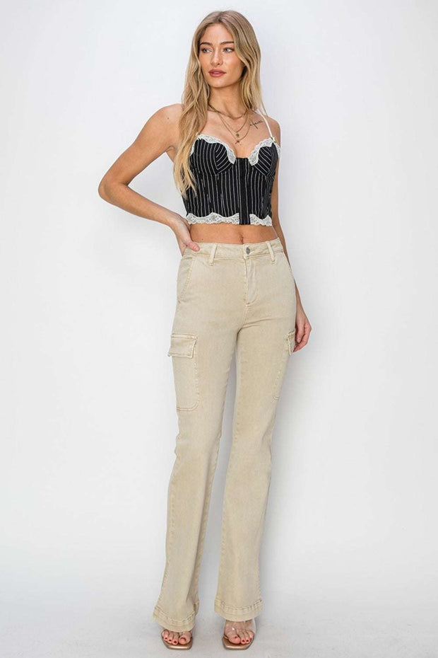 RISEN High Rise Boot-cut Jeans with black patterned top, showcasing flattering fit and classic design.