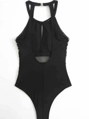 Black mesh backless swimsuit with cutout details and moderate stretch fabric