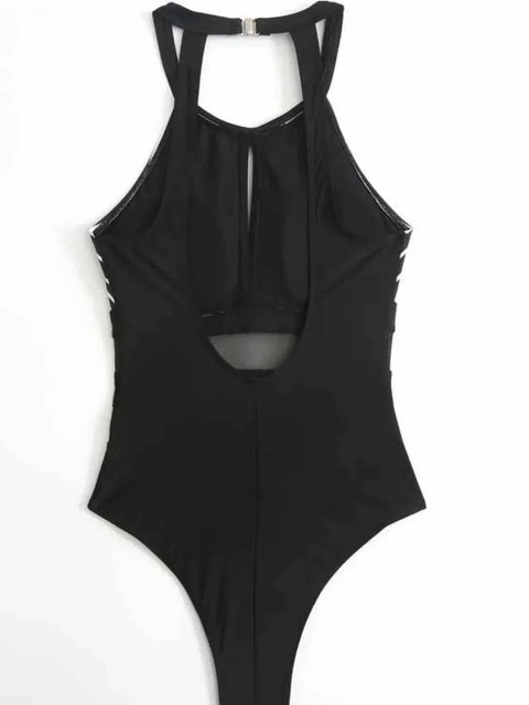 Black mesh backless swimsuit with cutout details and moderate stretch fabric