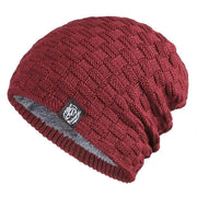 Tiger Label Fleece Hat in wine red with tiger label, warm and stylish knitted design.