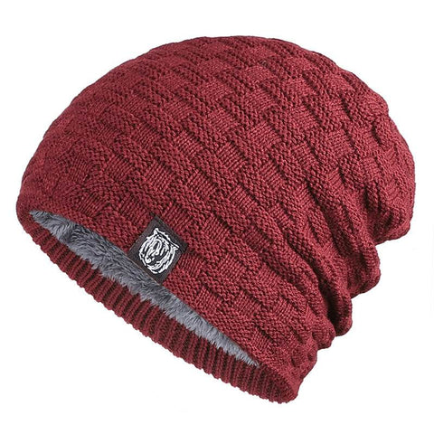 Tiger Label Fleece Hat in wine red with tiger label, warm and stylish knitted design.