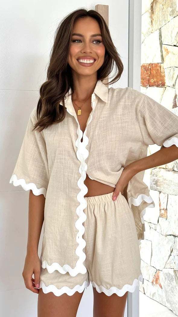 2 Piece Summer Suit in lightweight fabric with scalloped edges.