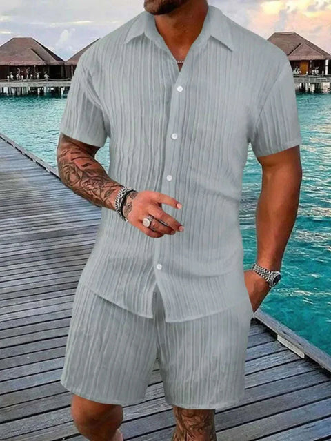Plus Size Button Down Shorts Set in light fabric with short sleeves, classic collar, and elastic waistband shorts.