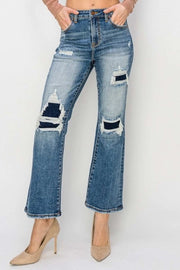 RISEN Distressed Flare Jeans with edgy distressed details and high-rise waist.