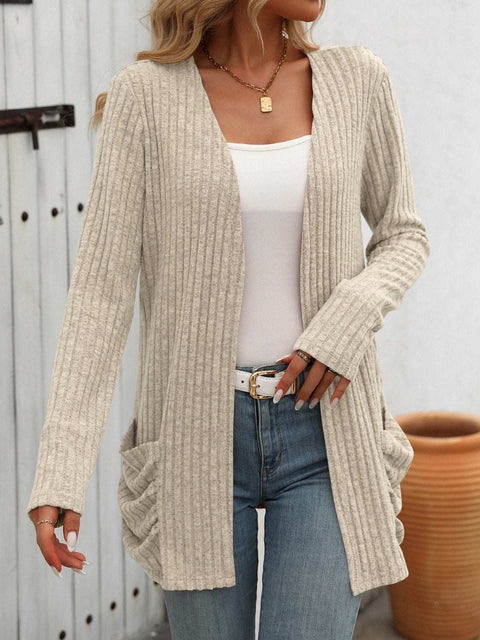 Open-Front Ribbed Cardigan in beige, featuring a chic open-front design with ribbed texture, worn over a white top and jeans.