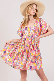 Floral babydoll dress with pockets, short sleeves, and colorful floral print.