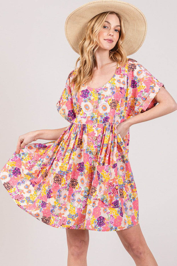 Floral babydoll dress with pockets, short sleeves, and colorful floral print.