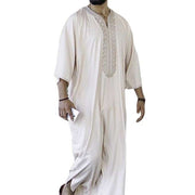 Embroidery White Muslim Robe with intricate embroidery, lightweight fabric, and loose fit.