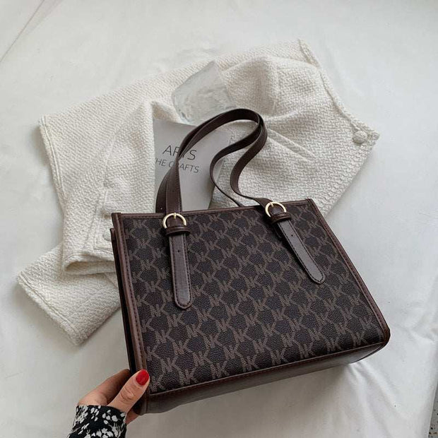 Large Capacity Handbag with stylish design and ample storage space.