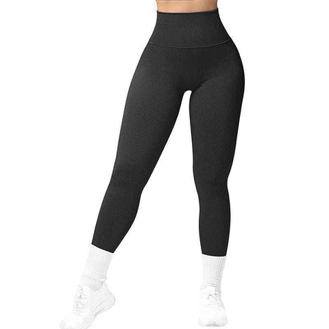 Breathable Yoga Suit in black with four-way stretch leggings for comfort and flexibility.