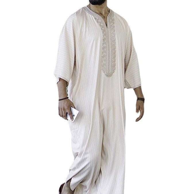Men's embroidered white Muslim thobe robe with elegant detailing and relaxed fit from Hot Topic Goods