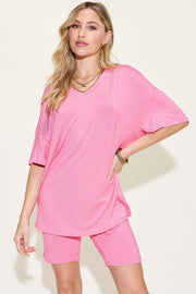 Bae V-Neck T-Shirt and Shorts Set in pink, featuring relaxed fit and breathable fabric ideal for casual and chic styles.