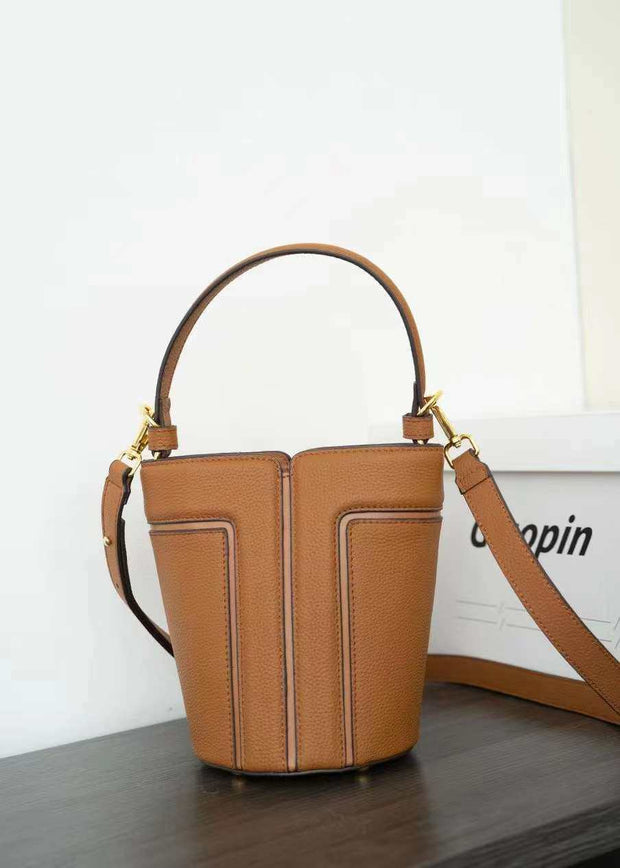 Large Capacity Shoulder Bag in golden brown genuine leather with organized compartments and adjustable strap.