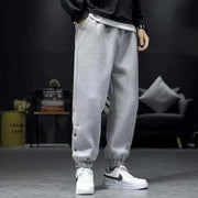 Casual Velvet Padded Pants in gray with elastic waistband and ankle strap, perfect for comfort and style.