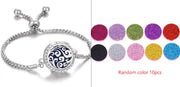 Hollow Stainless Steel Aromatherapy Bracelet with essential oil pads, adjustable design.
