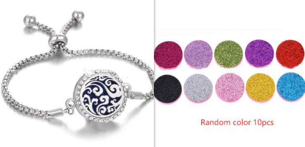 Hollow Stainless Steel Aromatherapy Bracelet with essential oil pads, adjustable design.