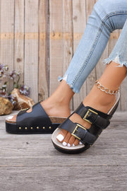 Chestnut Studded Platform Slides with buckle design and stud detailing.