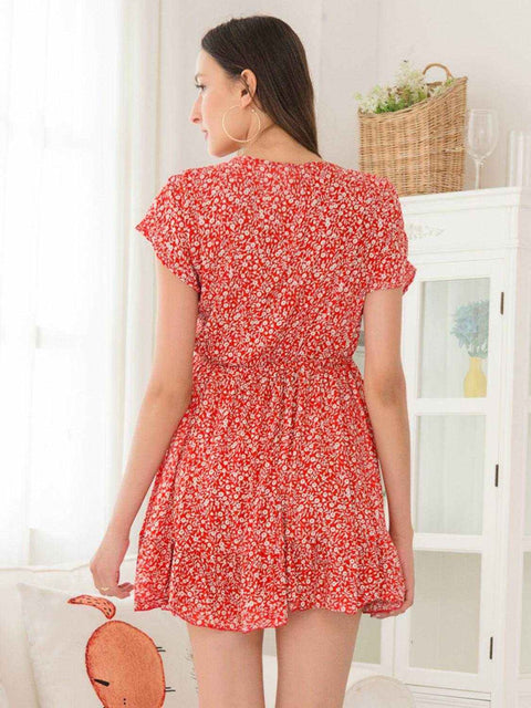 Ivy Lane Floral V-Neck Cap Sleeve Dress in red with floral pattern, back view.