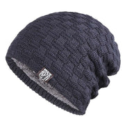 Navy blue Tiger Label Fleece Hat with knitted design and tiger label, unisex accessory.