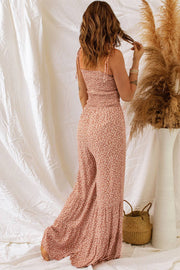 Dusk Blue Floral Jumpsuit with spaghetti straps and wide-leg design.