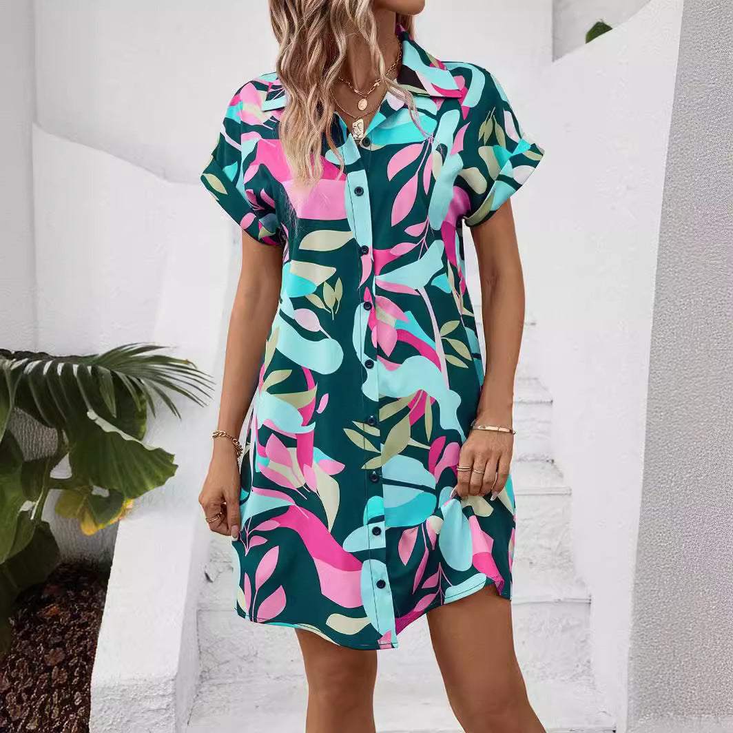 Woman wearing floral print short sleeve shirt dress with A-line silhouette and collared neckline outdoors