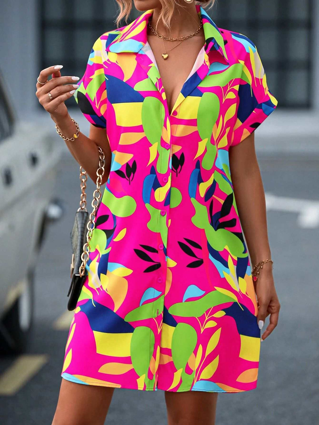 woman wearing floral print short sleeve shirt dress with collar and A-line silhouette