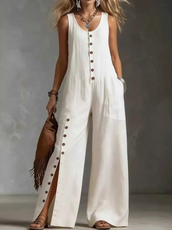 Women wearing full size sleeveless button-front wide leg jumpsuit from Hot Topic Goods