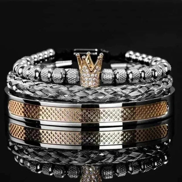 Handmade men's crown bracelets with gold-plated charm and pave CZ beads on stainless steel.