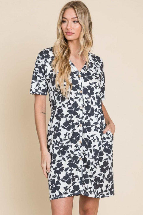 BOMBOM Floral Mini Dress with vibrant floral print and button-down front.