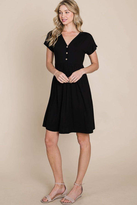 V-neck dress with short sleeves in black, featuring a relaxed fit and button detail, ideal for versatile styling.