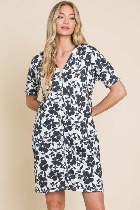 BOMBOM Floral Mini Dress with vibrant floral print and button-down front.
