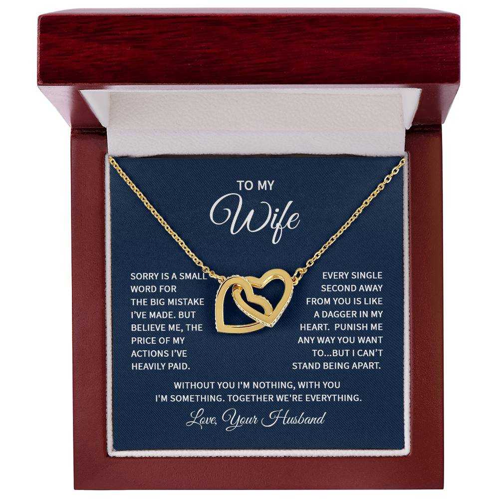 Interlocking Hearts Necklace for Wife with rose gold finish and CZ crystals as a meaningful apology gift from Hot Topic Goods