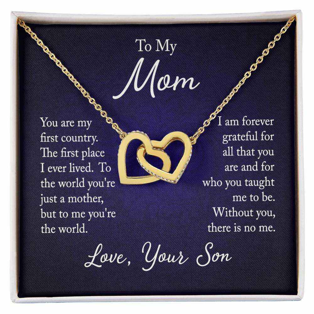 Close-up of an elegant interlocking hearts necklace for mom from son, symbolizing love and connection with CZ crystals and rose gold finish