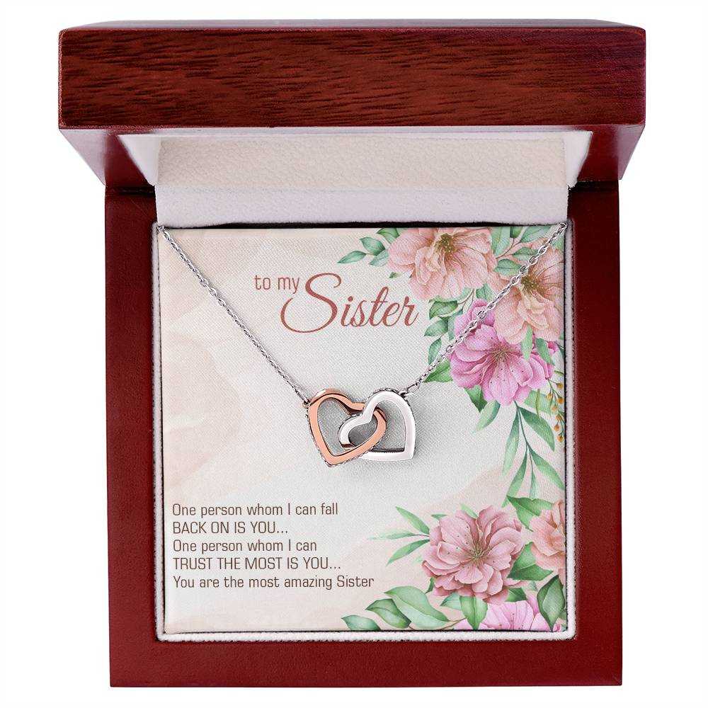 Interlocking Hearts Necklace for Sister with cubic zirconia crystals and rose gold finish from Hot Topic Goods