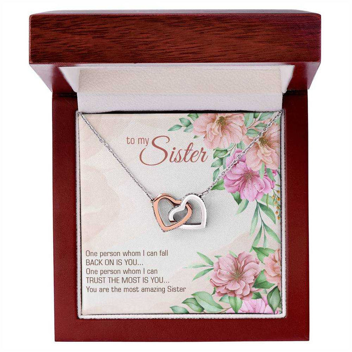 Interlocking Hearts Necklace for Sister with cubic zirconia crystals and rose gold finish from Hot Topic Goods