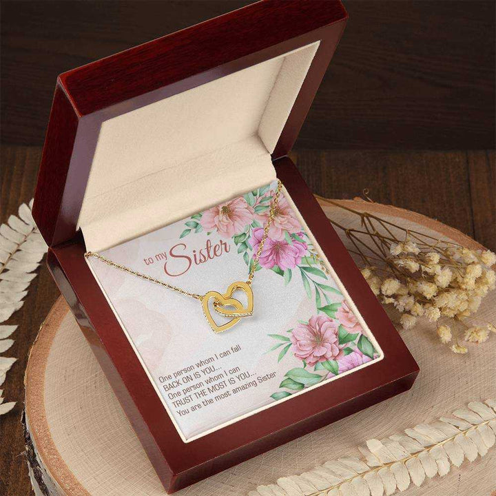 Interlocking Hearts Necklace for Sister with cubic zirconia crystals in rose gold finish from Hot Topic Goods