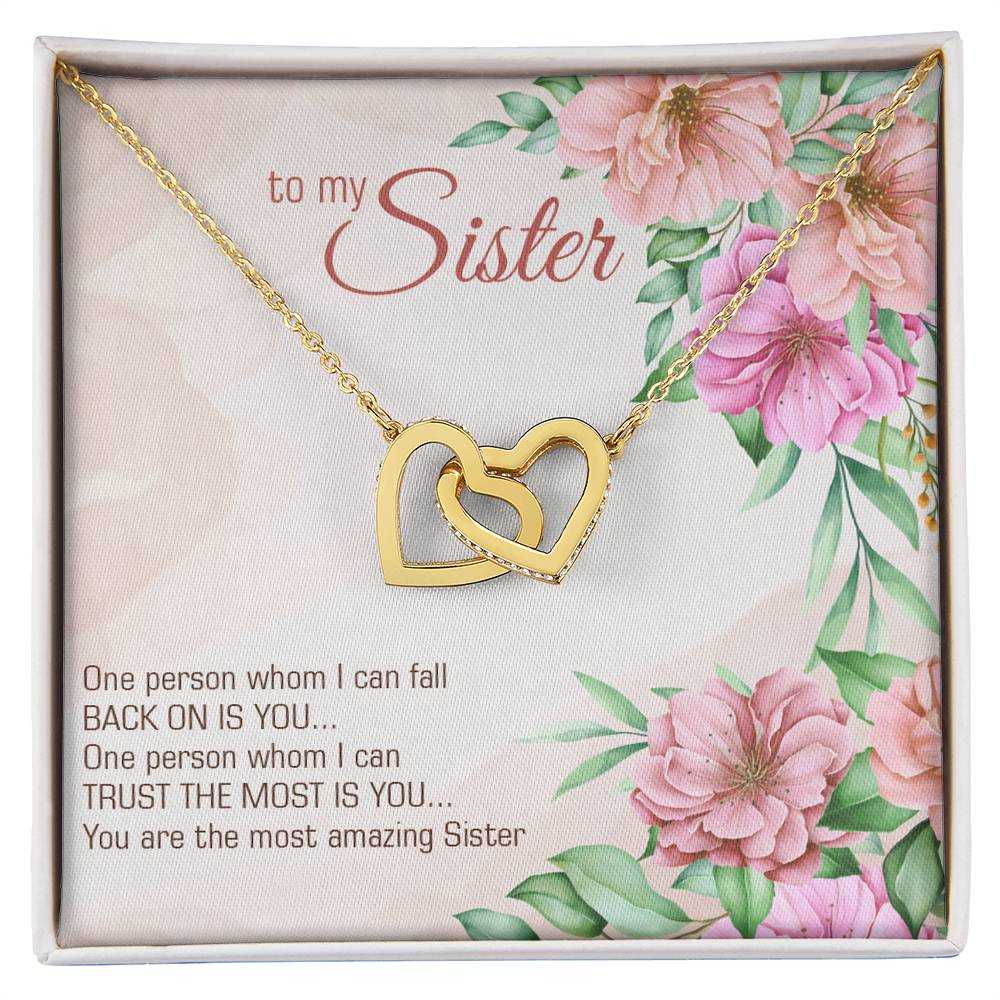 Interlocking Hearts Necklace for Sister with cubic zirconia crystals and adjustable chain from Hot Topic Goods