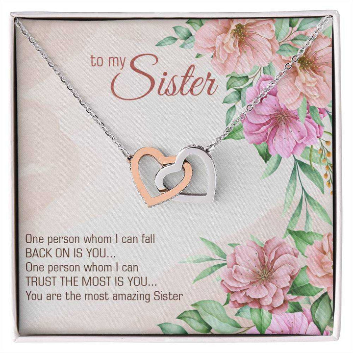 Interlocking Hearts Necklace for Sister with CZ crystals in rose gold finish from Hot Topic Goods