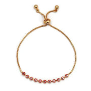 Elegant charm bracelet featuring red and gold beads, perfect for personal expression and style.