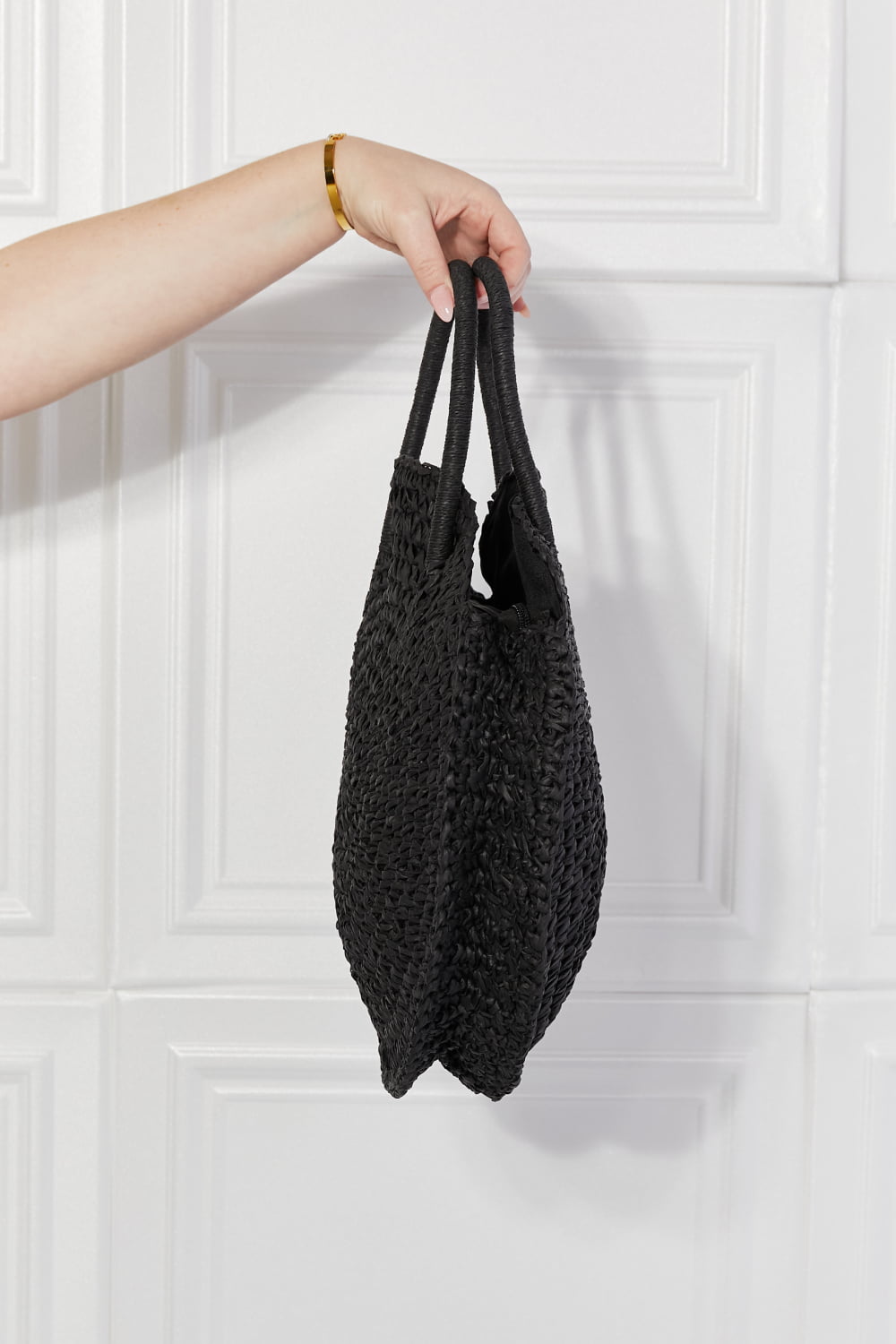 Justin Taylor Black Beach Date straw rattan handbag with woven design and black finish from Hot Topic Goods