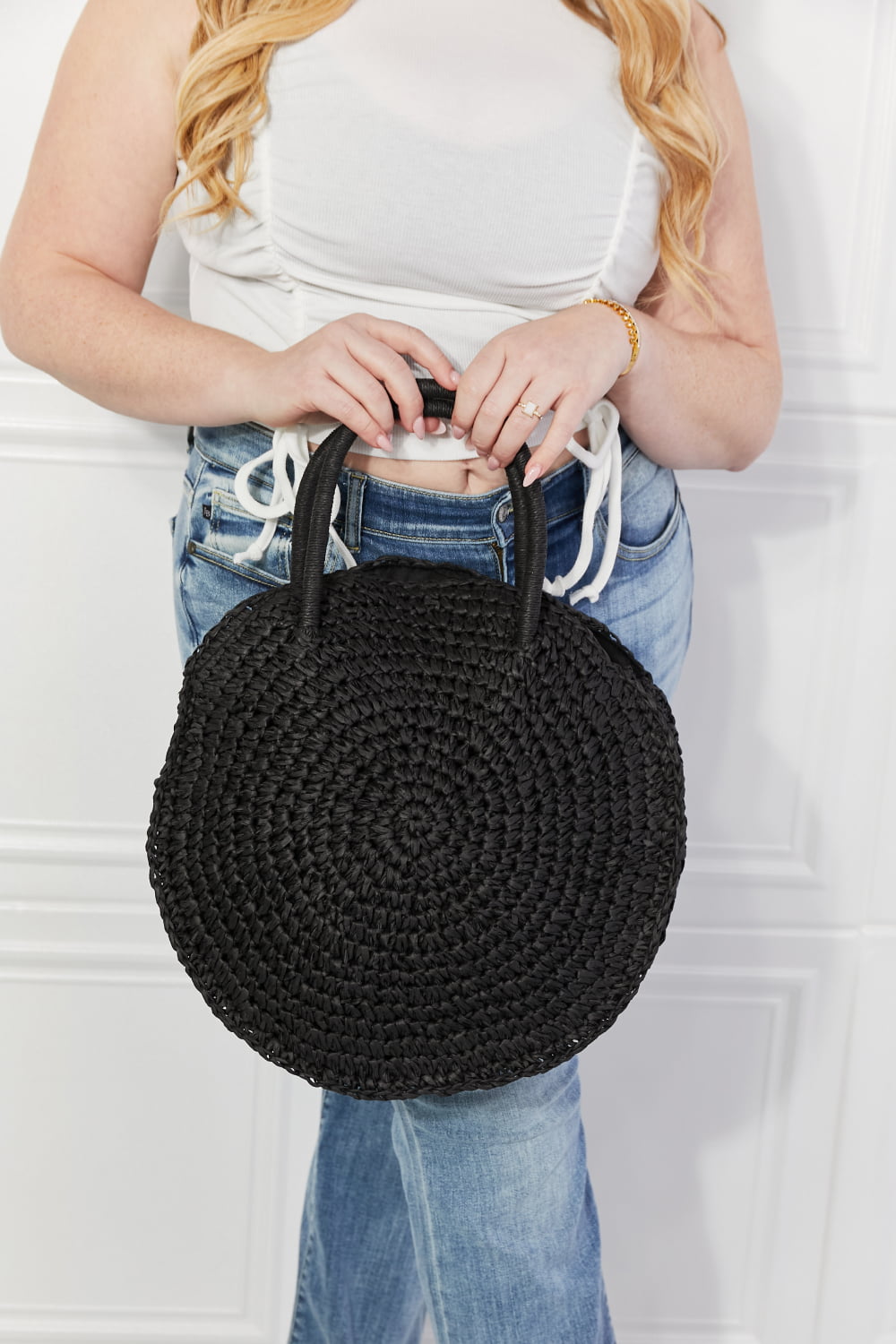 Justin Taylor Black Beach Date straw rattan handbag with woven texture and black finish