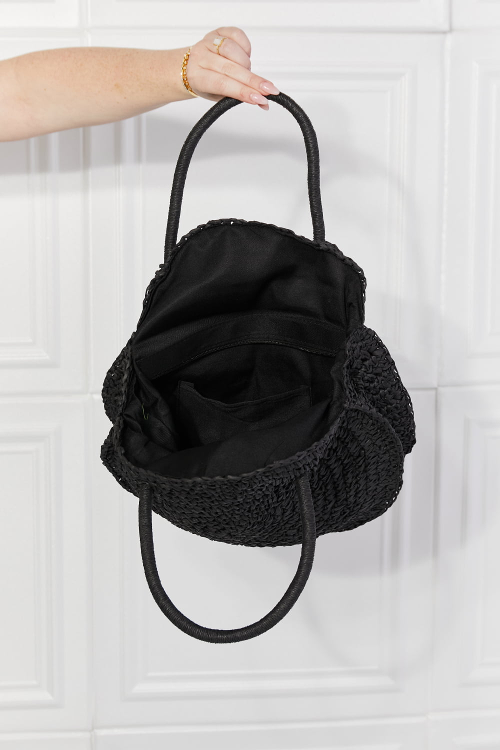 Justin Taylor Black Beach Date Straw Rattan Handbag with woven design and black finish