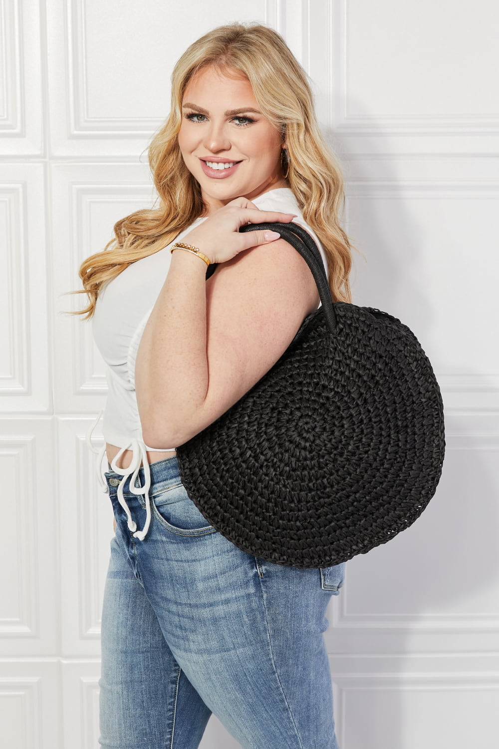 Justin Taylor Black Beach Date straw rattan handbag with black finish and woven design from Hot Topic Goods